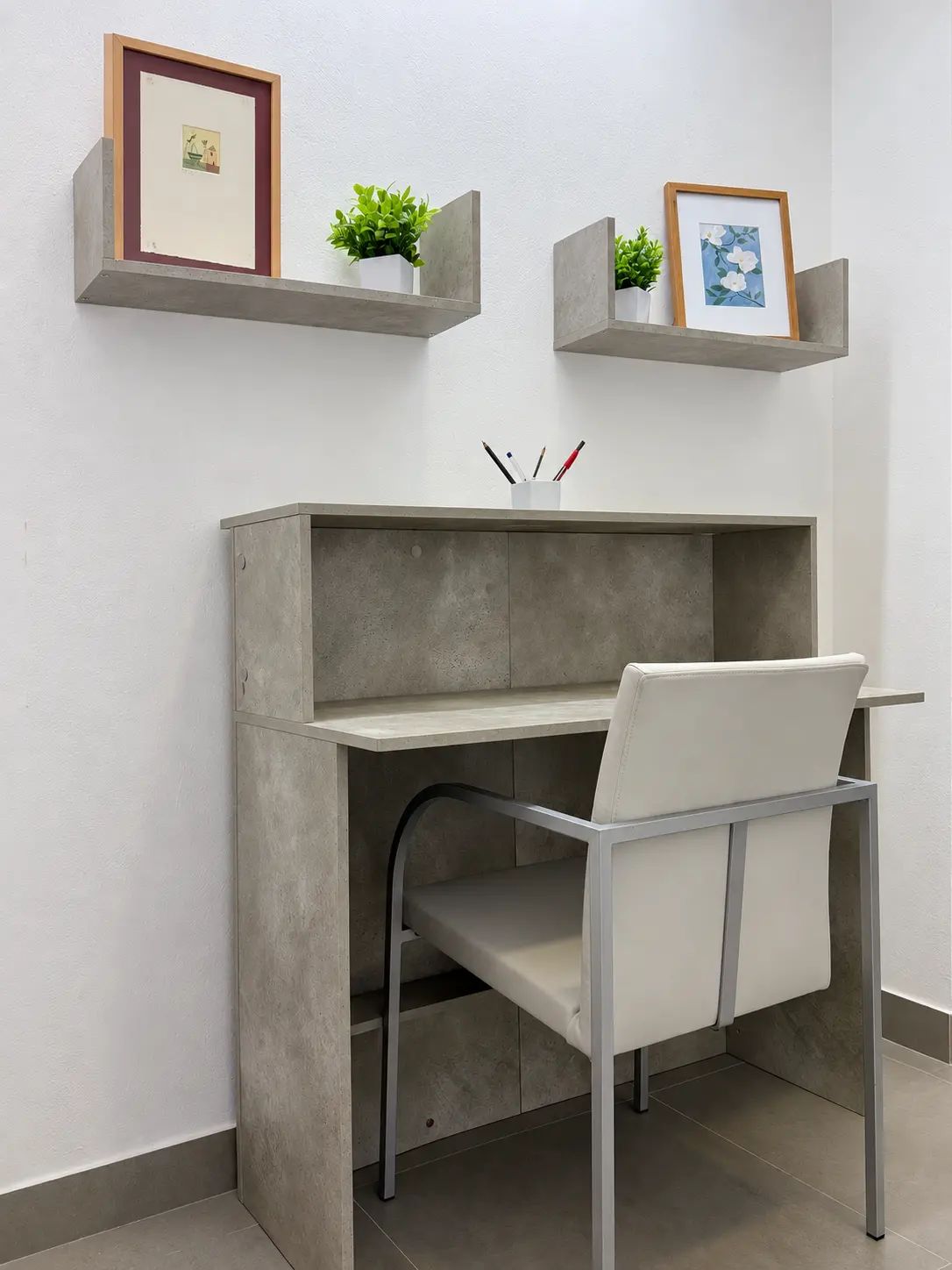 Work desk with a white chair, in a calm, bright corner of the centre.
